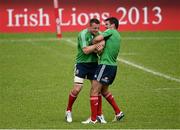 29 May 2013; Tommy Bowe, left, and Mike Phillips, British & Irish Lions, during squad training ahead of their game against Barbarian FC on Saturday. British & Irish Lions Tour 2013, Squad Training, Aberdeen Sports Ground, Hong Kong, China. Picture credit: Stephen McCarthy / SPORTSFILE