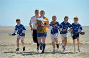 29 May 2013; Bord Gáis Energy U-21 Hurling ambassador Paul Flanagan, Clare, and Galway's Joe Canning, Breaking Through Player of the Year Judge, second from left, with pupils from Star of the Sea B.N.S, from left, Aidan Duffy, age 10, Ronan Shaw, age 11, Joshua Kuh Hogan, age 11, and James Crowley, age 10, after a training session where the ambassadors put the pupils from Star of the Sea B.N.S through their paces. The Bord Gáis Energy GAA U-21 Hurling Championship kicks off this Friday with Tipperary taking on Limerick in the Munster Championship in Semple Stadium Thurles. Throw in is at 7.30pm on Friday, 31st May and will be broadcast Live on TG4. Bord Gáis Energy U-21 Hurling ambassadors Declan Hannon, Limerick, and Jason Forde, Tipperary, took in some last minute training with the Pupils of Star of the Sea BNS ahead of their clash in the opening game of the Bord Gáis Energy U-21 Championship. Limerick will take on Tipperary in the Munster Championship at Semple Stadium, Thurles this Friday. Throw is at 7.30pm and the game will be shown live on TG4. Launch of Bord Gáis Energy GAA Hurling Under 21 Championship 2013, Star of the Sea B.N.S, Sandymount, Dublin. Picture credit: Brian Lawless / SPORTSFILE