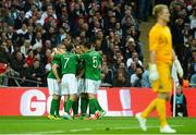 29 May 2013; Republic of Ireland's Shane Long, hidden, is congratulated by team-mates, including Aiden McGeady, 7, and Sean St. Ledger, 5, after scoring his side's first goal after thirteen minutes. Friendly International, England v Republic of Ireland, Wembley Stadium, London, England. Picture credit: David Maher / SPORTSFILE