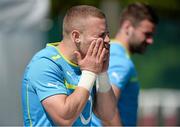 30 May 2013; Ireland's Ian Madigan applies sun cream before squad training ahead of the Ireland Rugby Tour to North America. Ireland Rugby Squad Training, Carton House, Maynooth, Co. Kildare. Picture credit: Matt Browne / SPORTSFILE