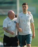 30 May 2013; Republic of Ireland's Shane Long with equipment officer Dick Redmond during squad training ahead of their Three International Friendly against Georgia on Sunday. Republic of Ireland Squad Training, Gannon Park, Malahide, Co. Dublin. Picture credit: David Maher / SPORTSFILE
