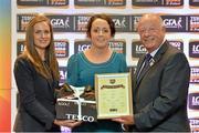 30 May 2013; Geraldine O'Flynn, Cork, is presented her certificate by Lynn Moynihan, left, Local Marketing Manager, TESCO Ireland, and Pat Quill, President of the Ladies Football Association, after being selected on the Tesco HomeGrown NFL Division 1 team of the year. 2013 TESCO HomeGrown Ladies National Football Team of the League Presentations. Croke Park, Dublin. Picture credit: Barry Cregg / SPORTSFILE
