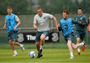31 May 2013; Republic of Ireland's Richard Dunne and Stephen Quinn in action during squad training ahead of their Three International Friendly against Georgia on Sunday. Republic of Ireland Squad Training, Gannon Park, Malahide, Co. Dublin. Picture credit: David Maher / SPORTSFILE