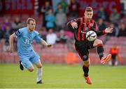 31 May 2013; Luke Byrne, Bohemians, in action against Ryan Brennan, Drogheda United. FAI Ford Cup, Second Round, Bohemians v Drogheda United, Dalymount Park, Dublin. Picture credit: Brian Lawless / SPORTSFILE