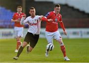 31 May 2013; Sean Brennan, Shelbourne, in action against Sean Holland, Bandon. FAI Ford Cup, Second Round, Shelbourne v Bandon, Tolka Park, Dublin. Picture credit: Barry Cregg / SPORTSFILE