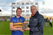 31 May 2013; Jason Forde, Tipperary, is presented with the Man of the Match award by Ger Cunningham, Sports Ambassador with Bord Gais Energy. Bord Gais Energy Munster GAA Under 21 Hurling Championship, Quarter-Final, Tipperary v Limerick, Semple Stadium, Thurles, Co. Tipperary. Picture credit: Diarmuid Greene / SPORTSFILE