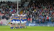 31 May 2013; The Tipperary team stand together during the National Anthem. Bord Gais Energy Munster GAA Under 21 Hurling Championship, Quarter-Final, Tipperary v Limerick, Semple Stadium, Thurles, Co. Tipperary. Picture credit: Diarmuid Greene / SPORTSFILE