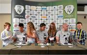 3 June 2013; Republic of Ireland players, from left, Sean St. Ledger, Stephen Kelly and Conor Sammon faced tough questions from children, from left to right, Matthew Nolan, age 7, Katie Ewing, age 9, Freya Watts age 7 and Levi Cuise O'Sullivan, age 7, at Three's 'Kids Press Conference' ahead of the Republic of Ireland v Faroe Islands World Cup qualifier on Friday. To see the Three's 'Kid Conference' video visit www.facebook.com/3Ireland. Portmarnock Hotel & Golf Links, Portmarnock, Co. Dublin. Picture credit: David Maher / SPORTSFILE