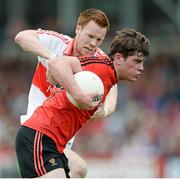 2 June 2013; Niall Madine, Down, in action against Aidan McAlynn, Derry. Ulster GAA Football Senior Championship, Quarter-Final, Derry v Down, Celtic Park, Derry. Picture credit: Oliver McVeigh / SPORTSFILE