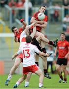 2 June 2013; Kalum King, Down, supported by Keith Quinn, in action against Ryan Bell and Benny Heron, Derry. Ulster GAA Football Senior Championship, Quarter-Final, Derry v Down, Celtic Park, Derry. Picture credit: Oliver McVeigh / SPORTSFILE