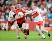 2 June 2013; Ryan Boyle, Down, in action against Brian McCallion and Enda Lynn, Derry. Ulster GAA Football Senior Championship, Quarter-Final, Derry v Down, Celtic Park, Derry. Picture credit: Oliver McVeigh / SPORTSFILE