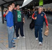 3 June 2013; Sam Warburton, British & Irish Lions, poses for a photograph with Paudie Collins, from Freemount, Cork, right, and David McCarthy, Kanturk, Cork, as head coach Warren Gatland walks past at Perth International Airport upon the squad's arrival in Australia for the British & Irish Lions Tour 2013. Perth International Airport, Perth, Australia. Picture credit: Stephen McCarthy / SPORTSFILE