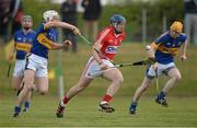 12 May 2013; Patrick Horgan, Cork, in action against Brendan Maher, left, and Donagh Maher, Tipperary. Official Opening of New Cloughduv GAA Complex, Cork v Tipperary, Fr.O'Driscoll Park, Cloughduv, Co. Cork. Picture credit: Brendan Moran / SPORTSFILE