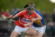 12 May 2013; Peter O'Brien, Cork, in action against Thomas Stapleton, Tipperary. Official Opening of New Cloughduv GAA Complex, Cork v Tipperary, Fr.O'Driscoll Park, Cloughduv, Co. Cork. Picture credit: Brendan Moran / SPORTSFILE