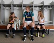 5 June 2013; Hurling stars Henry Shefflin, Kilkenny, Seán Óg Ó hAilpín, Cork, Damien Hayes, Galway, and Eoin Kelly, Tipperary, got together in Croke Park to mark Centra's fourth year, as official sponsor of the GAA Hurling All-Ireland Senior Championship. These four all-star players, along with John Mullane will be getting together with Centra to spread the GAA message through a series of family community hurling events in stadiums and clubs throughout Ireland this summer. For more information on the Centra Community Events see centra.ie or find Centra Ireland on Facebook and Twitter for details on how to register. Pictured at the launch is Kilkenny's Henry Shefflin, with twins Alanna, left, and Faye McEntaggart, age 7, from Dunshaughlin, Co. Meath. Croke Park, Dublin. Picture credit: Brian Lawless / SPORTSFILE