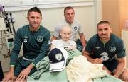 5 June 2013; Republic of Ireland's Robbie Keane, Richard Dunne and Jonathan Walters with Chloe Boyle, age 14, from Drogheda, Co. Louth, during a visit to Our Lady's Children's Hospital. Our Lady's Children's Hospital, Crumlin, Dublin. Picture credit: David Maher / SPORTSFILE
