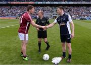 1 June 2013; Westmeath captain Kieran Gavin, left, and Dublin captain Stephen Cluxton shake hands before the game in front of referee Eddie Kinsella. Leinster GAA Football Senior Championship Quarter-Final, Dublin v Westmeath, Croke Park, Dublin. Picture credit: Ray McManus / SPORTSFILE