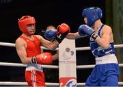 7 June 2013; Michael Conlan, right, Ireland, exchanges punches with Ovik Ogannisian, Russia, during their 52Kg Flyweight semi-final bout. EUBC European Men's Boxing Championships 2013, Minsk, Belarus. Photo by Sportsfile