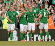 7 June 2013; Republic of Ireland's Robbie Keane, second from left, celebrates with team-mates from left, Jonathan Walters, Aiden McGeady and Siman Cox after scoring his side's second goal. 2014 FIFA World Cup Qualifier, Group C, Republic of Ireland v Faroe Islands, Aviva Stadium, Lansdowne Road, Dublin. Picture credit: Brian Lawless / SPORTSFILE