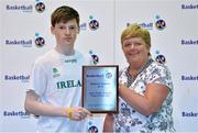 8 June 2013; Stephen O'Hanlon, Kubs, Dublin, is presented with the AICC Under 16 Boy's Player of the Year award by Rovena Fahy, NABC. Basketball Ireland Annual Awards 2012/2013, National Basketball Arena, Tallaght, Dublin. Picture credit: Barry Cregg / SPORTSFILE