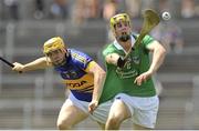 9 June 2013; Dan Morrissey, Limerick, in action against David Young, Tipperary. Munster GAA Hurling Intermediate Championship Semi-Final, Limerick v Tipperary, Gaelic Grounds, Limerick. Picture credit: Pat Murphy / SPORTSFILE