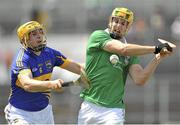 9 June 2013; Dan Morrissey, Limerick, in action against David Young, Tipperary. Munster GAA Hurling Intermediate Championship Semi-Final, Limerick v Tipperary, Gaelic Grounds, Limerick. Picture credit: Pat Murphy / SPORTSFILE