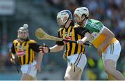 9 June 2013; T.J. Reid, Kilkenny, in action against David Kenny, Offaly. Leinster GAA Hurling Senior Championship Quarter-Final, Offaly v Kilkenny, O'Connor Park, Tullamore, Co. Offaly. Picture credit: Brian Lawless / SPORTSFILE