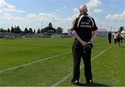 9 June 2013; Kilkenny manage Brian Cody stands for the National Anthem. Leinster GAA Hurling Senior Championship Quarter-Final, Offaly v Kilkenny, O'Connor Park, Tullamore, Co. Offaly. Picture credit: Brian Lawless / SPORTSFILE