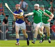 9 June 2013; Shane Bourke, Tipperary, in action against Tom Condon and Stephen Walsh, right, Limerick. Munster GAA Hurling Senior Championship Semi-Final, Limerick v Tipperary, Gaelic Grounds, Limerick. Picture credit: Pat Murphy / SPORTSFILE