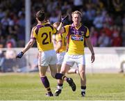 9 June 2013; PJ Banville, right, is congratulated by team-mate Shane Roche, Wexford, after scoring his side's second goal. Leinster GAA Football Senior Championship Quarter-Final, Louth v Wexford, County Grounds, Drogheda, Co. Louth. Picture credit: Dáire Brennan / SPORTSFILE
