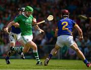 9 June 2013; Seamus Hickey, Limerick, in action against Paddy Stapleton, 2, and Conor O'Mahony, Tipperary. Munster GAA Hurling Senior Championship Semi-Final, Limerick v Tipperary, Gaelic Grounds, Limerick. Picture credit: Ray McManus / SPORTSFILE