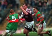 13 February 2000; Aidan Poniard, St. Mary's Athenry, in action against Barry Whelahan (5) and Johnny Pilkington, Birr. St. Mary's Athenry v Birr, AIB All Ireland Club Hurling Championship Semi Final, Semple Stadium, Thurles. Picture credit; Ray Lohan/SPORTSFILE