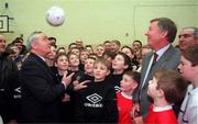 23 February 2000; An Taoiseach Bertie Ahern, T.D. heads the ball to Manachester United Manager Sir Alex Ferguson at the launch of the Shelbourne F.C. & Manchester United Strategic Alliance in Sports Link. Sports link, Co. Dublin. Soccer. Picture credit; Dave Maher/SPORTSFILE
