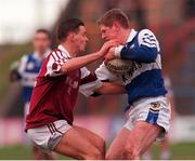 23 January 2000; Brian McDonald, Laois in action against Damien Healy, Westmeath, O'Byrne Cup Football Semi Final, O'Moore Park, Portlaoise. Picture credit; Damien Eagers/SPORTSFILE
