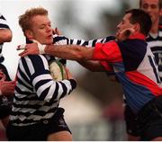 22 January 2000; Gavin McCarthy, Blackrock is tackled by Mickey Rainey, Belfast Harlequinns, A.I.B League Divison 2, Blackrock v Belfast Harlequinns, Stradbrook, Dublin. Rugby. Picture credit; Damien Eagers/SPORTSFILE