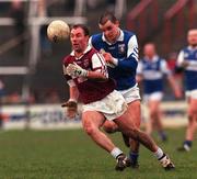 23 January 2000; Ger Heavin, Westmeath in action against Derek Conway, O'Byrne Cup Football Semi Final, O'Moore Park, Portlaoise. Picture credit; Damien Eagers/SPORTSFILE