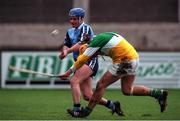 30 January 2000; John Finnegan, Dublin in action against Ger Oakley, Offaly, Walsh Cup Senior Hurling, Dublin v Offaly, Parnell Park. Picture credit; Ray Lohan/SPORTSFILE