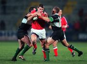 12 November 1999; Cian Mahoney, Munster, in action against Eric Elwood (left) and Nigel Carolan, Connacht. Munster v Connacht, Interprovincial Championship, Thomond Park, Limerick. Rugby. Picture credit; Brendan Moran/SPORTSFILE