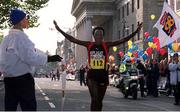 25 October 1999; Kenya's Esther Kiplagat on her way to winning The 1999 98FM Dublin City Marathon, O'Connell Street, Dublin. Athletics. Picture credit; Ray Lohan/SPORTSFILE
