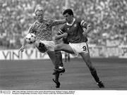18 June 1988; John Aldridge of Republic of Ireland in action against Ronald Koeman of Netherlands during the UEFA European Football Championship Finals Group B match between Republic of Ireland and Netherlands at Parkstadion in Gelsenkirchen, Germany. Photo by Ray McManus/Sportsfile