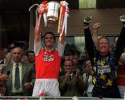 1 August 1999; Jarlath Fallon, Armagh Captain lifts the Anglo Celt Cup celebrating Armagh's victory with goalkeeper Brendan Tierney. Armagh v Down, Ulster Senior Football Final, Clones. Picture credit; Damien Eagers/SPORTSFILE