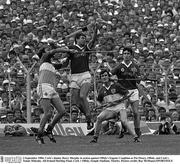 2 September 1984; Cork's Jimmy Barry Murphy in action against Offaly's Eugene Coughlan as Pat Fleury, Offaly, and Cork's Tomás Mulcahy. All-Ireland Hurling Final, Cork v Offaly, Semple Stadium, Thurles. Picture credit; Ray McManus/SPORTSFILE