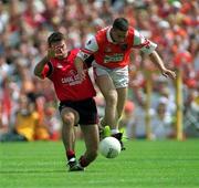 1 August 1999; Diarmuid Marsden, Armagh in action against Finbar Caulfield, Down, Ulster Football Championship Final, St Tighhearnach's Park, Clones. Picture credit; Damien Eagers/SPORTSFILE
