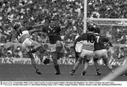 2 September 1984; Cork's John Crowley in action against Offaly's Brendan Bermingham (11), Mark Corrigan (10) and Cork's Dermot McCurtin (7). All-Ireland Hurling Final, Cork v Offaly, Semple Stadium, Thurles. Picture credit; Ray McManus/SPORTSFILE