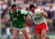 27 June 1999; Matt McGleenan, Tyrone, in action against Paul Courtney, Fermanagh. Tyrone v Fermanagh, Ulster Senior Football Championship, St. Tiernan's Park, Clones, Monaghan. Picture credit; David Maher/SPORTSFILE