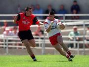 11 July 1999; Matt McGleenan, Tyrone in action against Michael Magill, Down, Ulster Football Championship Semi Final, Casement Park. Picture Credit; Damien Eagers/SPORTSFILE