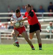 11 July 1999; Matt McGleenan, Tyrone in action against Michael Magill, Down, Ulster Football Championship Semi Final, Casement Park. Picture Credit; Damien Eagers/SPORTSFILE