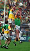 4 July 1999; James Grennan, Offaly goes up for the ball with John McDermott, Meath. during the Meath v Offaly  Leinster Football Championship, at Croke Park, Dublin. Picture credit; Matt Browne/SPORTSFILE.