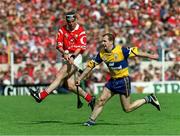4 July 1999; Neil Ronan, Cork, in action against Liam Doyle, Clare. Cork v Clare, Munster Hurling Final, Semple Stadium, Thurles. Picture credit; Damien Eagers/SPORTSFILE