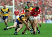 4 July 1999; Niall Gilligan, Clare, in action against Seán Og O hAilpin (right) and Fergal Ryan, Cork. Cork v Clare, Munster Senior Hurling Final, Semple Stadium, Thurles. Picture credit; Brendan Moran/SPORTSFILE